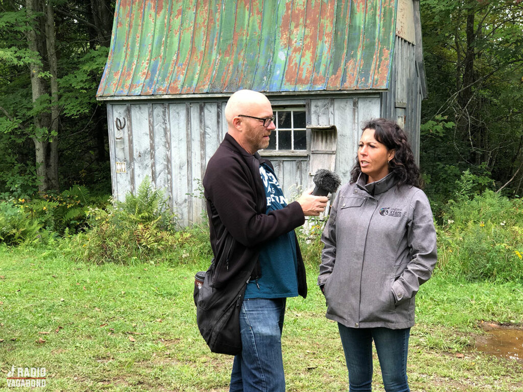 Patricia tells me about the Sugar Shack (behind us)