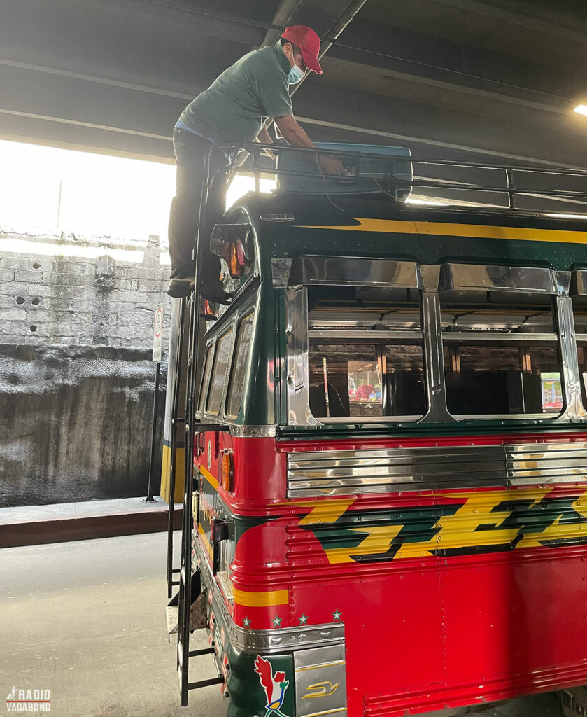 He picked up my heavy suitcase and climbed up on the roof of the bus in Guatemala City